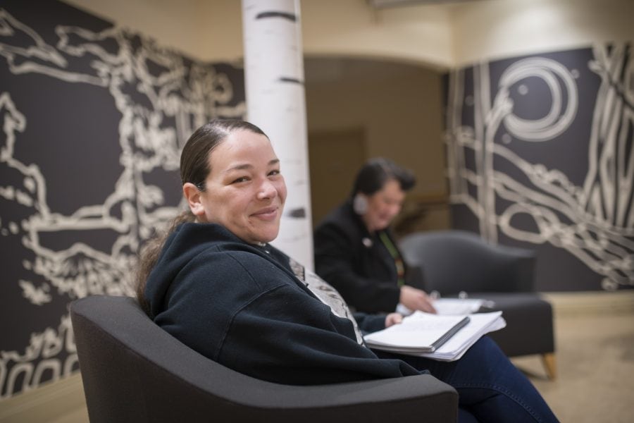 Indigenous student smiling in turtle lounge